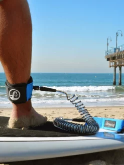 Poseidon SUP Leash - Coiled -Poseidon Paddle & Surf Sales Poseidon SUP Leash Coiled on ankle
